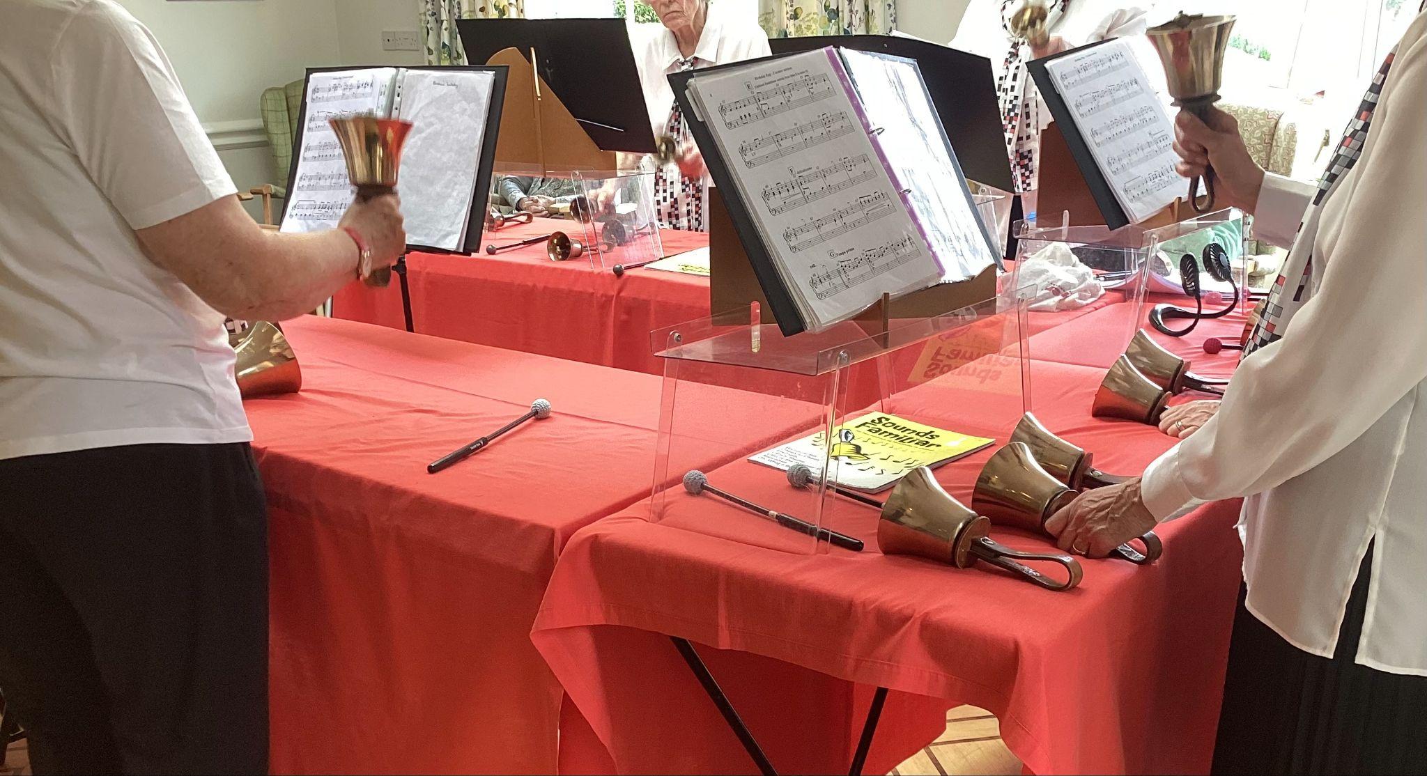The Bodicote Bell Ringers performing in the Main Sitting Room.