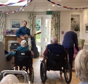 Residents singing along with Tristan.
