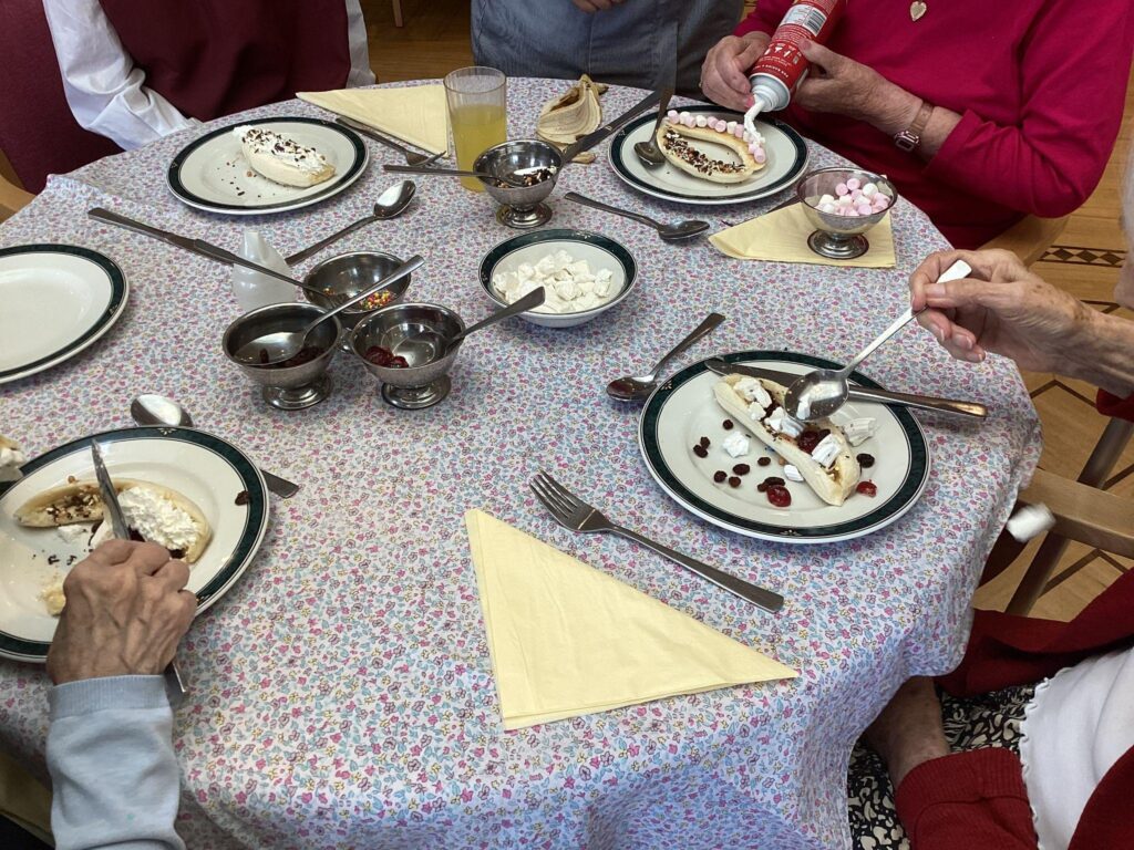 Residents creating and consuming blissful banna splits.