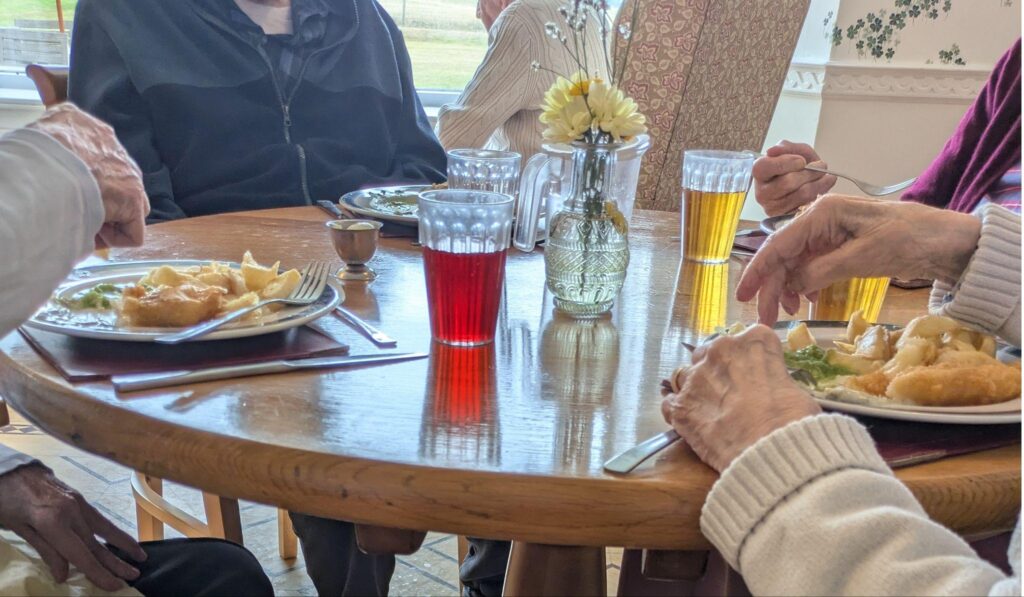 Residents enjoying their fish and chips lunch.