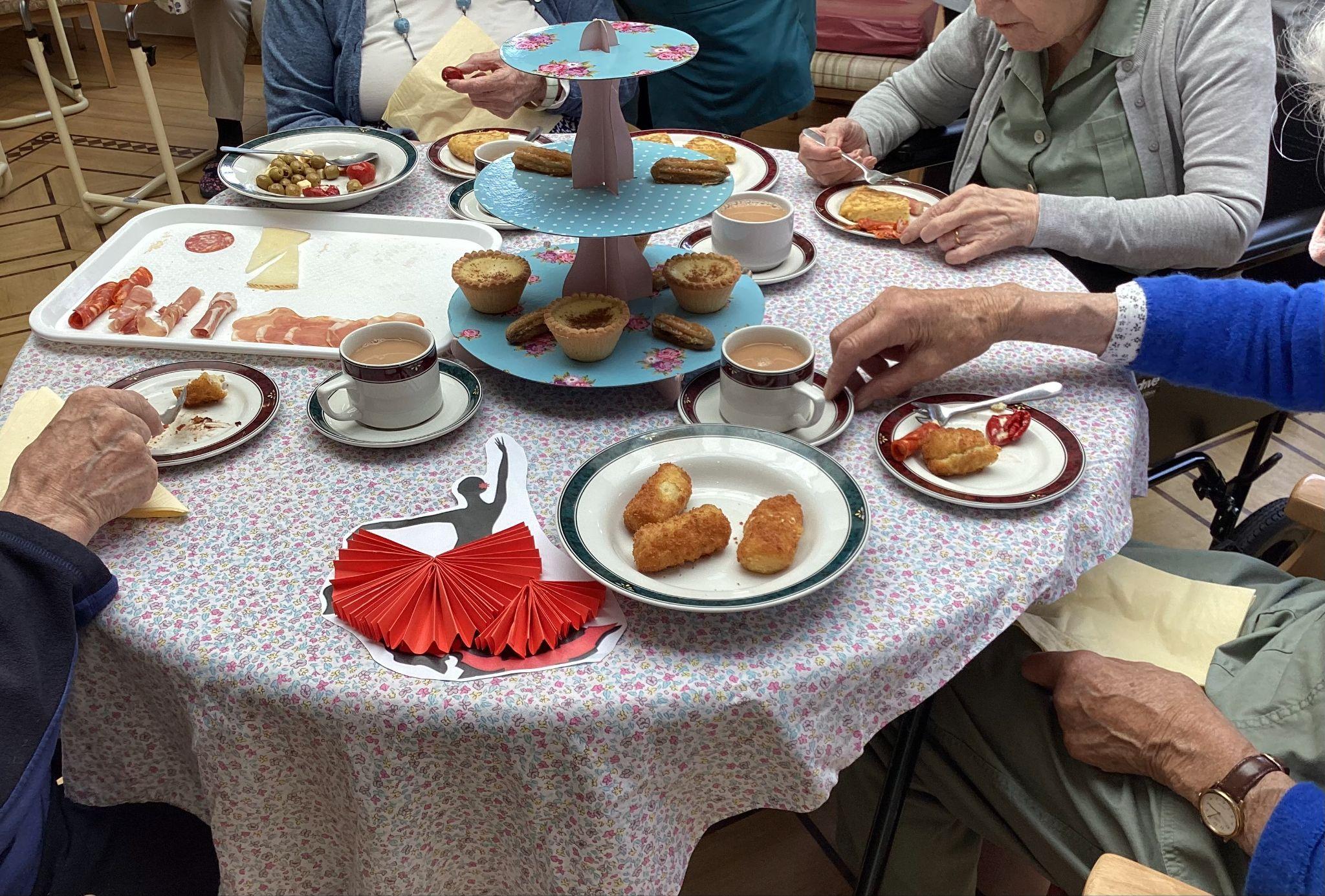 Residents enjoying a Tapas Afternoon Tea.